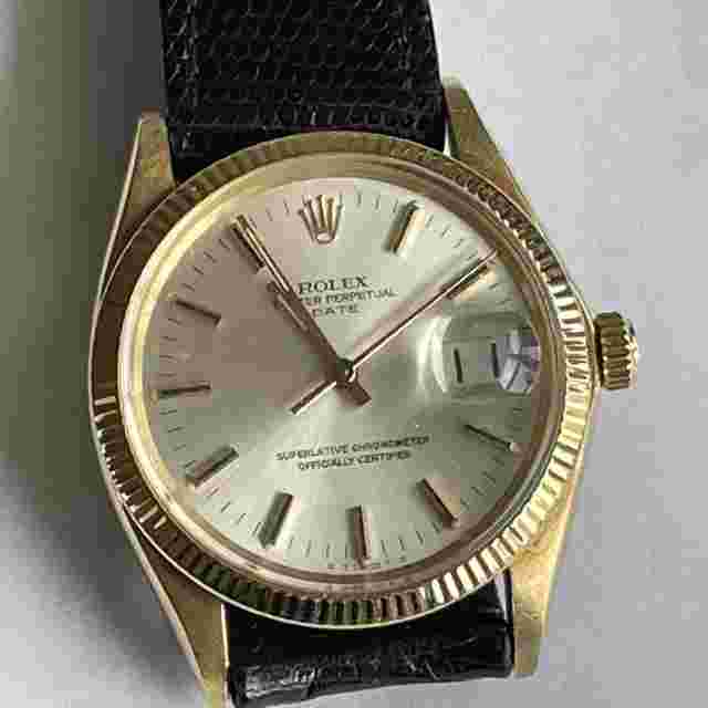 Rolex Oyster Perpetual Date
                           
                                 Ultra-rare 1973 Vintage Sigma Dial Oyster Perpetual Date in 14K Gold