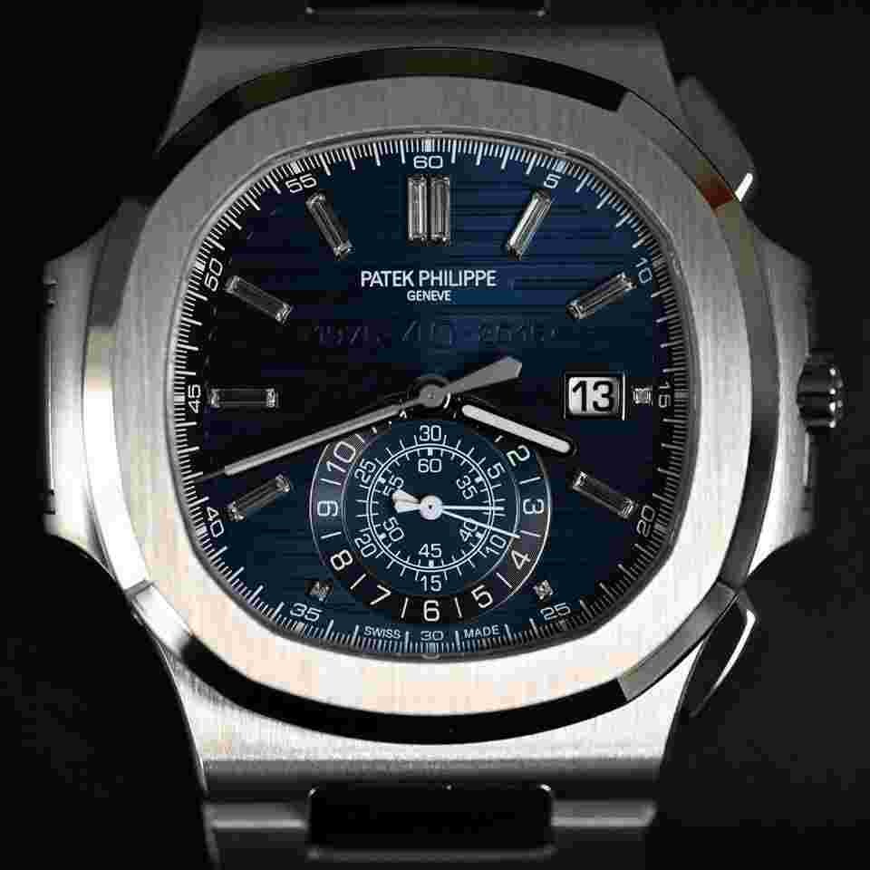Patek Philippe Nautilus
                           
                                 5976/1G Chronograph 40th Anniversary White Gold Blue Dial Baguette Markers 44mm