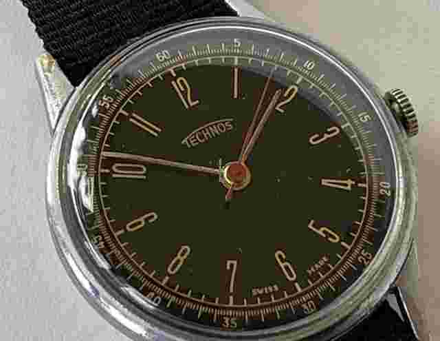 Technos
                           
                                 Military Officers Style WW2 1939 Stainless Steel Black Dial Swiss Made