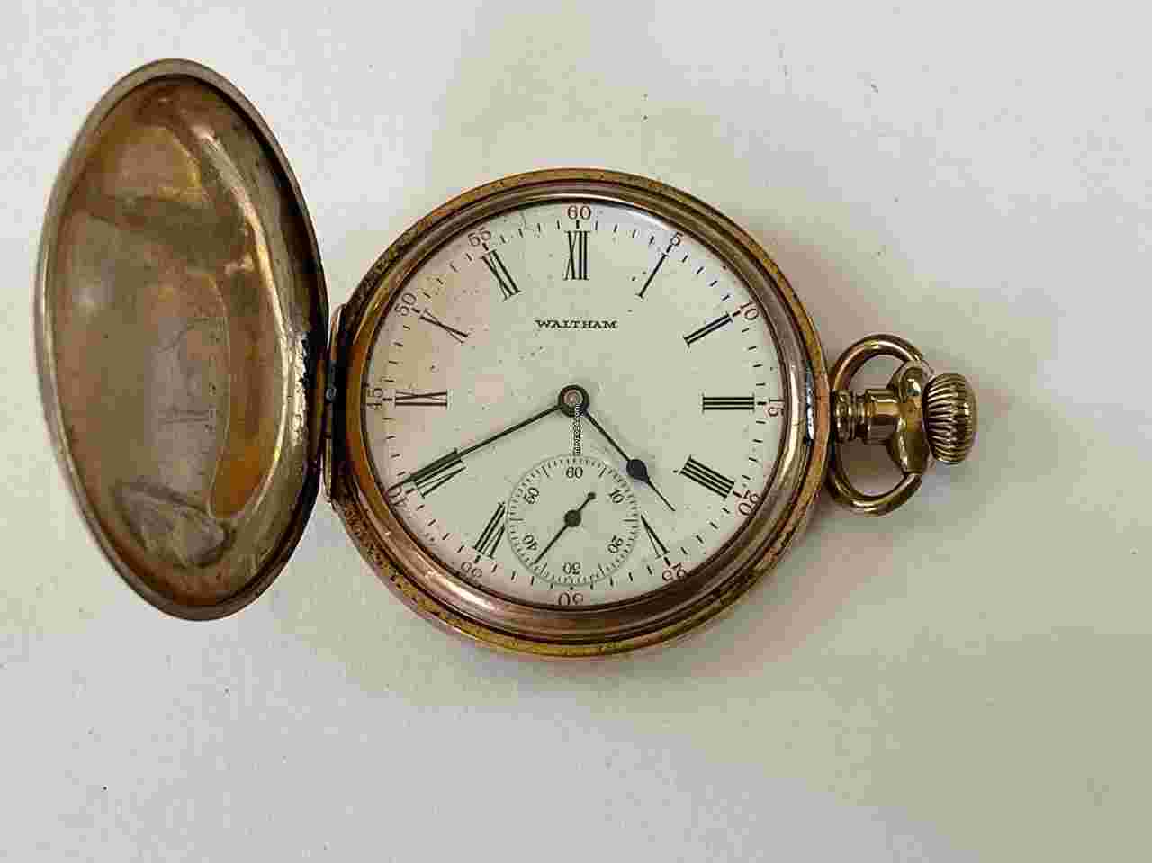 Waltham
Traveler Gold Capped Hunter Case Savonette Antique Pocket Watch Porcelain Dial 17J USA