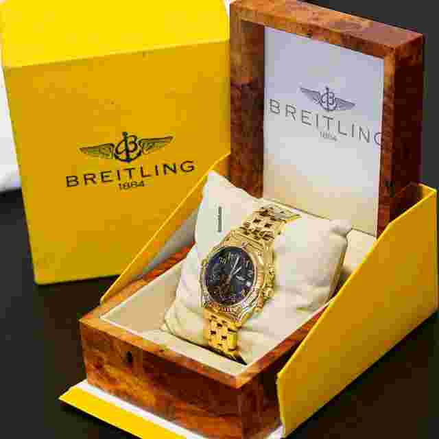 Breitling Chronomat
                           
                                 1884 Black Dial In 18K Gold With Box/Papers