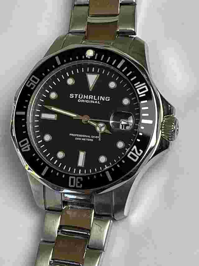 Stuhrling
                           
                                 Original Professional Diver 200Meters Magnifier Date Black Dial Screw Down Case Back