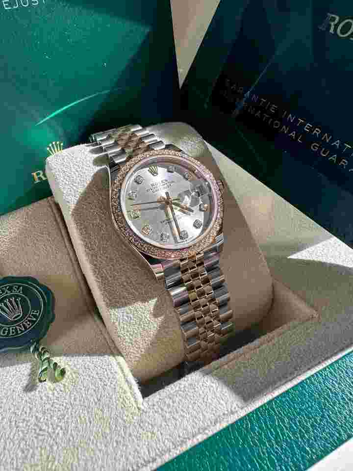 Rolex Datejust 31
NEW 2024 Silver Diamond Dial Diamond Bezel Two Tone Yellow Gold Jubilee