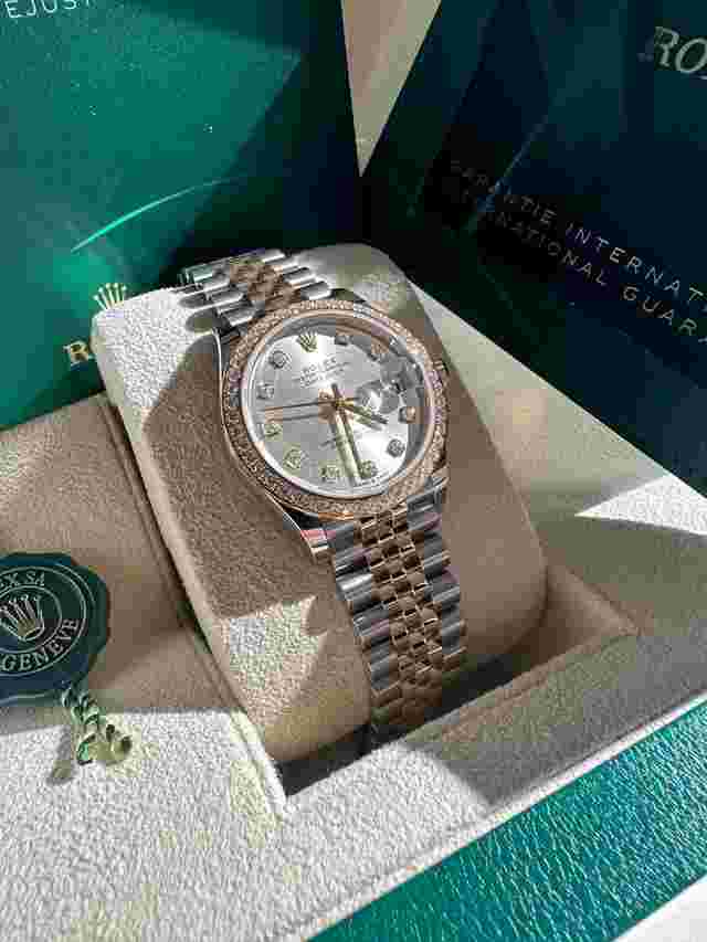 Rolex Datejust 31
                           
                                 NEW 2024 Silver Diamond Dial Diamond Bezel Two Tone Yellow Gold Jubilee