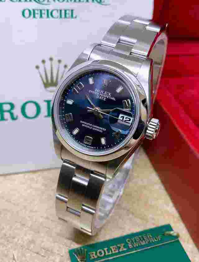 Rolex Oyster Perpetual Lady Date
                           
                                 Lady-Datejust 26mm 69160 Blue Dial B&P 1999 Serviced By Rolex in 2024