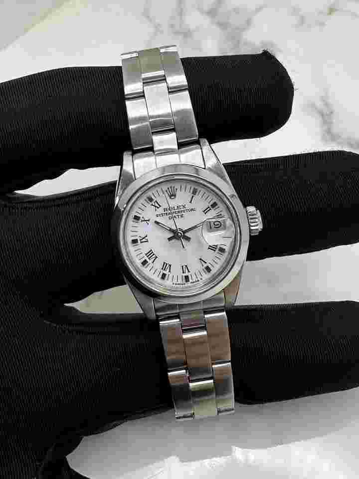 Rolex Oyster Perpetual Lady Date
White Roman Dial WITH PAPERS