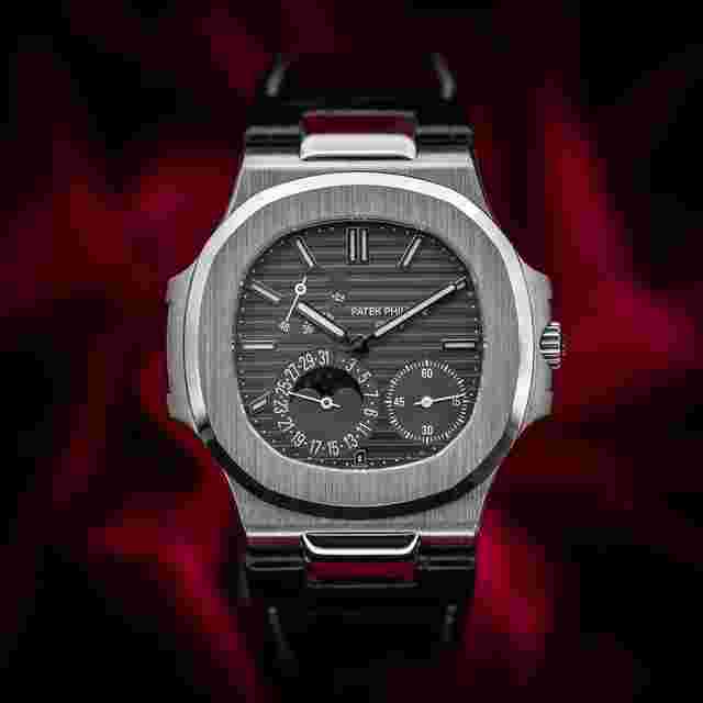 Patek Philippe Nautilus
                           
                                 Moonphase 5712G-001 18k White Gold 40mm MINT