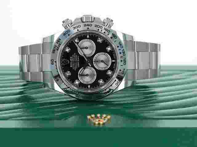 Rolex Daytona
                           
                                 Cosmograph Daytona 18kt White Gold Bright Black & Steel Diamond Dial Spray-Coated Counters