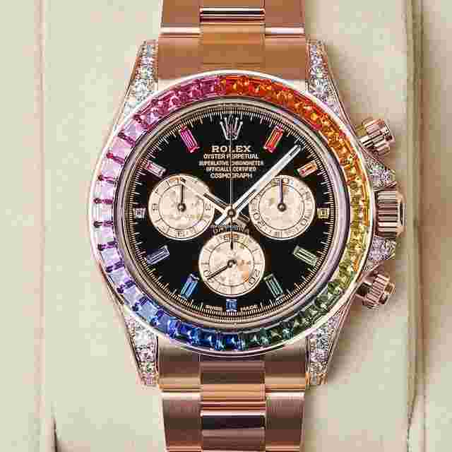 Rolex Daytona
                           
                                 Cosmograph Daytona 40mm Rainbow Sapphire Bezel Everose Gold Black Diamond Baguette Dial