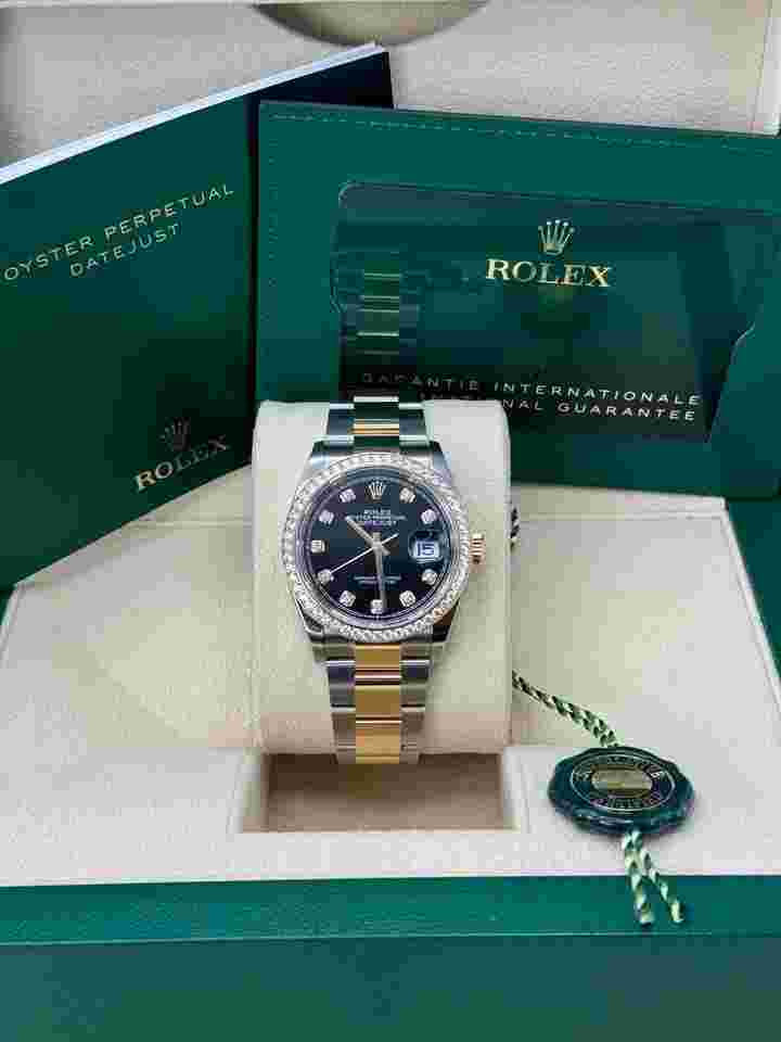 Rolex Datejust 36
NEW 2023 Black Diamond Dial Diamond Bezel Two Tone Yellow Gold Oyster