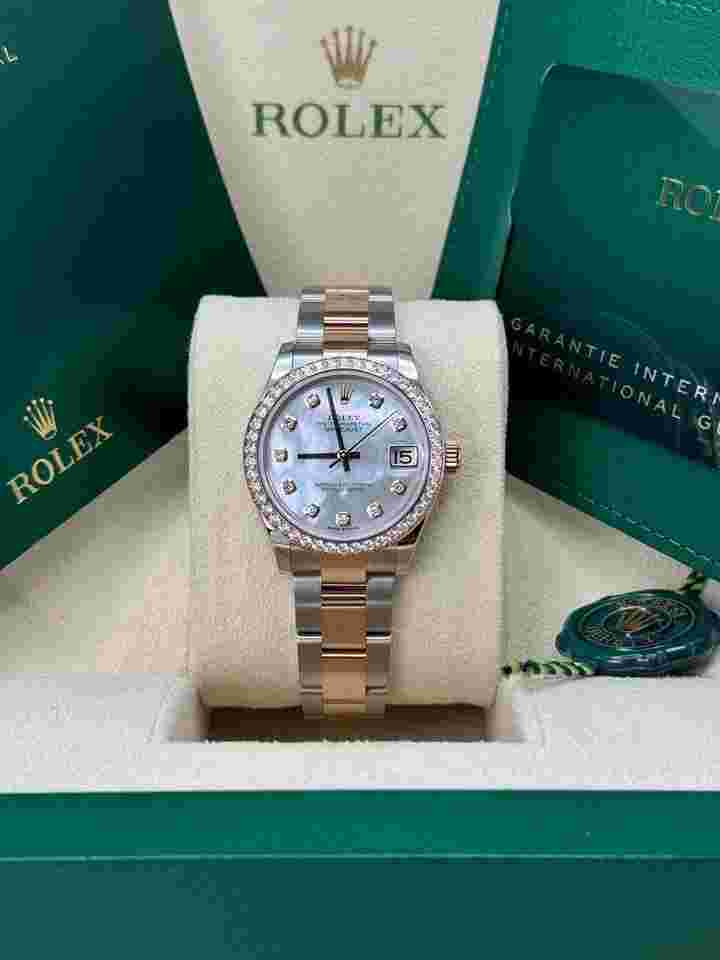 Rolex Datejust 31
NEW 2024 Mother of Pearl Diamond Dial Diamond Bezel Two Tone Rose Gold Oyster