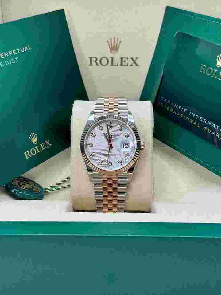 Rolex Datejust 36
NEW 2023 Silver Palm Motif Diamond Dial Fluted Two Tone Rose Gold Jubilee
