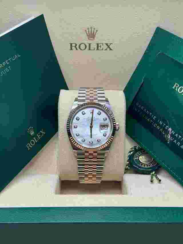 Rolex Datejust 36
                           
                                 NEW 2024 Mother of Pearl Diamond Dial Two Tone Rose Gold Fluted Bezel Jubilee
