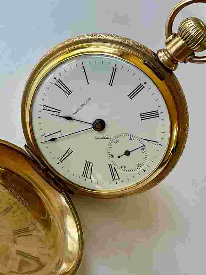 Waltham
Solid10K Gold Hunter Case White Porcelain Dial Roman Numbers Antique Pocket Watch USA