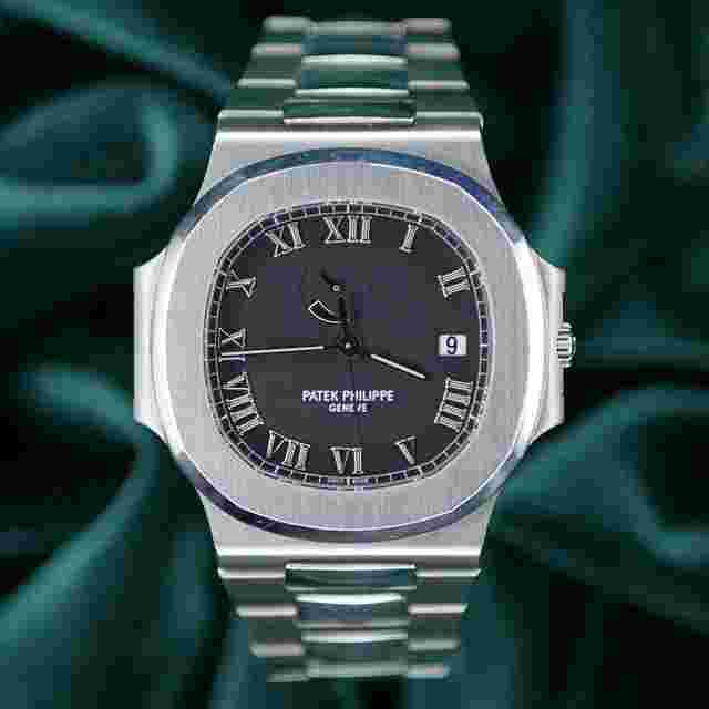 Patek Philippe Nautilus
                           
                                 FULL SET EXCELLENT Nautilus Jumbo Power Reserve “Comet” 42MM Black Dial 3710/1A-001
