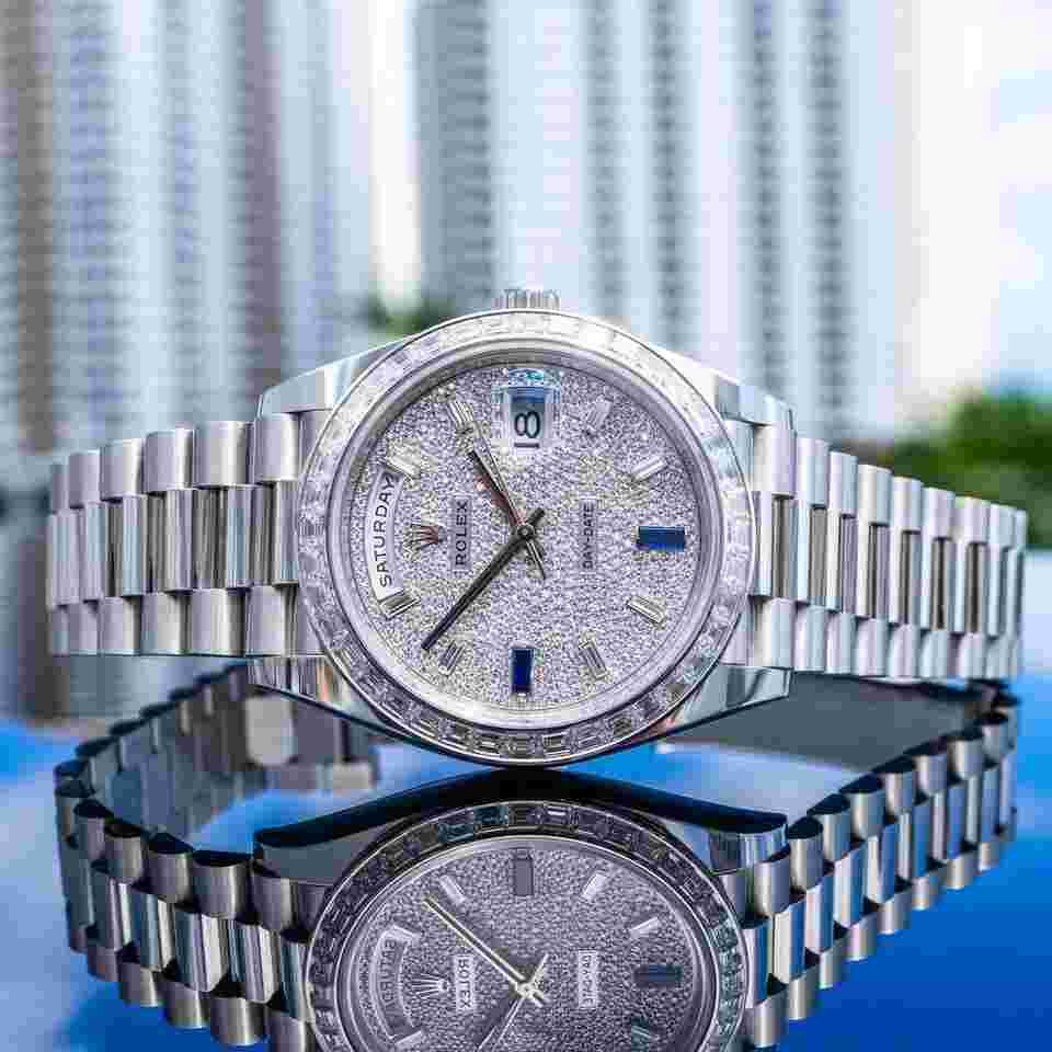 Rolex Day-Date 40
Unworn Day-Date 40mm Platinum with Baguette Bezel 228396TBR Pave Dial