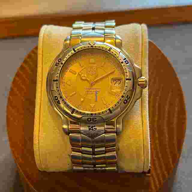 TAG Heuer 6000
                           
                                 Series Yellow Gold Automatic Date