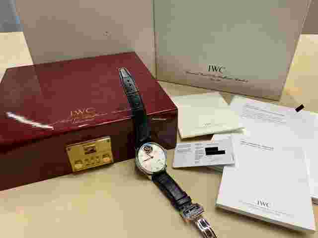 IWC Portuguese Tourbillon
                           
                                 Mystère Limited Portuguese Box & Papers 2004's service just being done