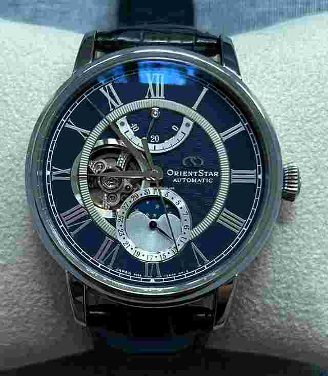 Orient Star
                           
                                 Moon Phase Power Reserve Open heart