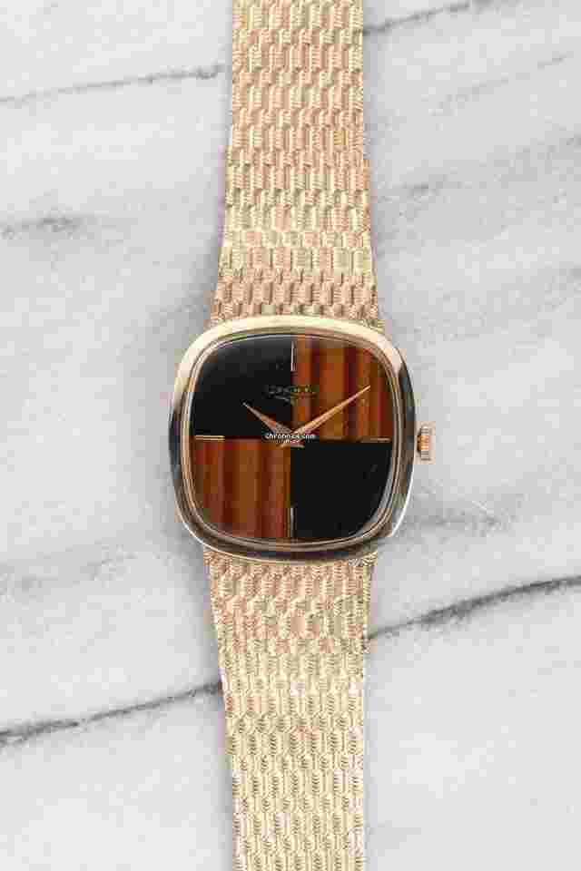 Longines
                           
                                 Vintage 70s 14K Yellow Gold Manual Wind Onyx & Tiger Eye 30mm Case.
