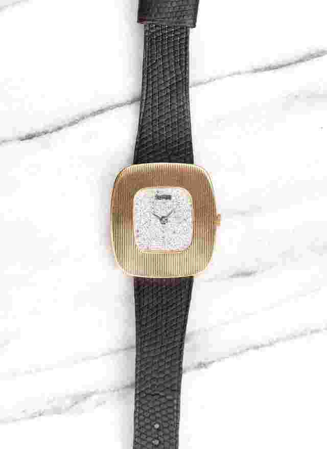 Piaget
                           
                                 Reference 99022 Vintage 1980s Manual Wind 18K Yellow Gold Diamond Pave Dial.