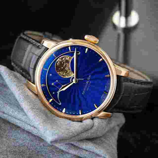 Arnold & Son HM Perpetual Moon
                           
                                 Phase 90 Hour Blue Guilloche Dial Rose Gold