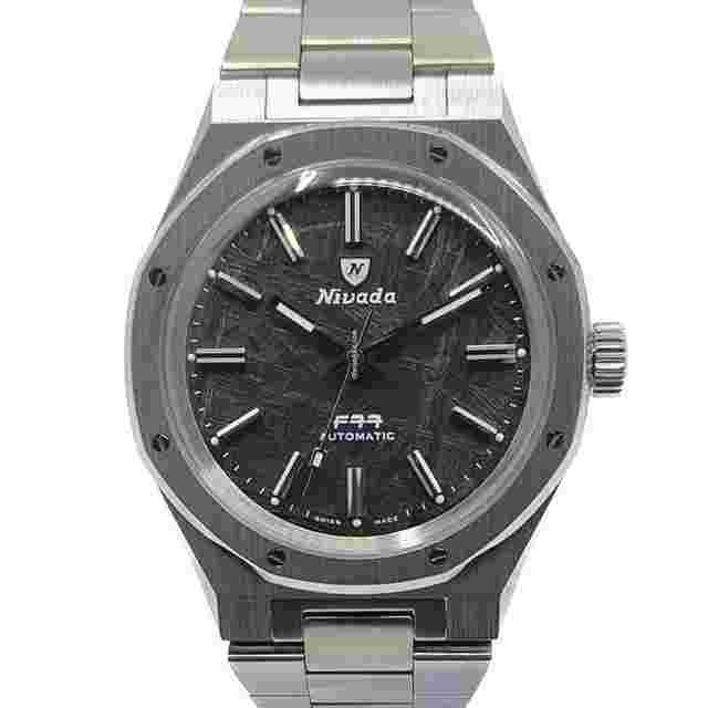 Nivada
                           
                                 Grenchen F77 Titanium Meteorite