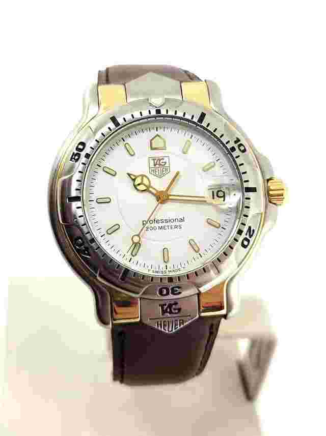TAG Heuer 6000
                           
                                 S/Steel & 18k Mens TAG HEUER 6000 PROFESSIONAL 200m Watch Ref WH1151 EXLNT