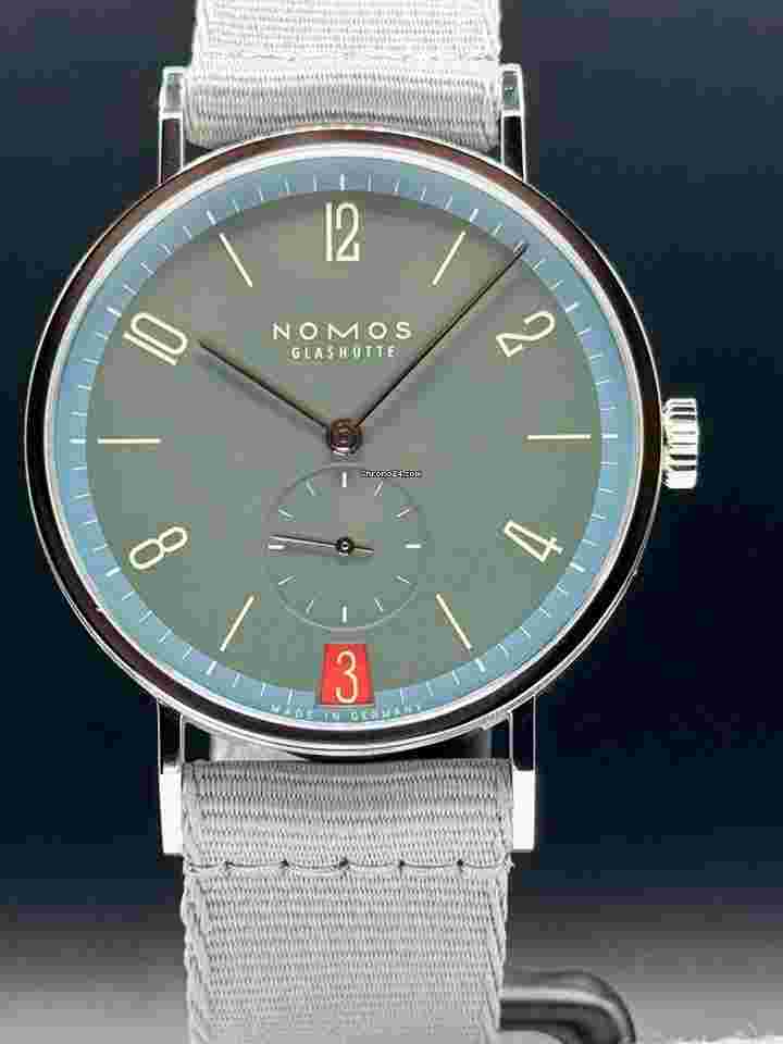 NOMOS Tangente 38
                           
                                 Glashütte179.S18 Tangente 38 Date Lakritze