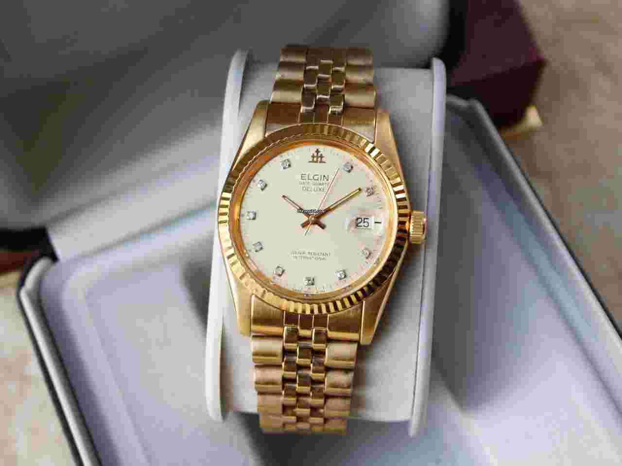 Elgin
                           
                                 Date Quartz De Luxe Presidental Gold/Steel Swiss Cal. D-010