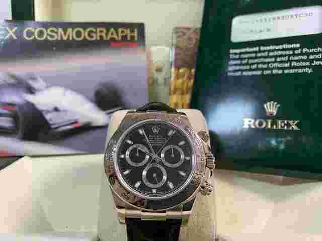 Rolex Daytona
                           
                                 Like NEW 2005 Cosmograph Daytona White Gold Black Dial Leather Strap 116519 FULL SET