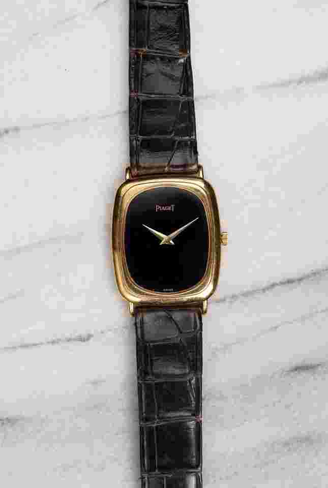 Piaget
                           
                                 Reference 9251 Vintage 1970s Manual Wind 18K Yellow Gold Tank Black Onyx Dial