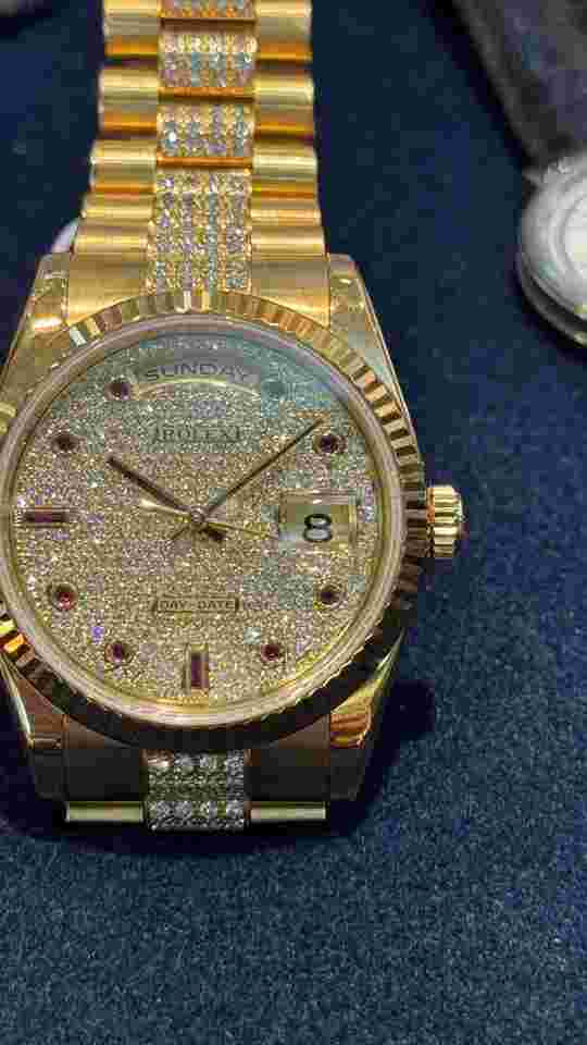 Rolex Day-Date 36
                           
                                 Oyster Perpetual Day-Date 118238 All Factory Original Pave Dial w Ruby indexes & bracelet