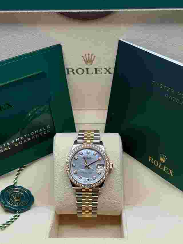 Rolex Datejust 31
                           
                                 Mother of Pearl Diamond Dial Two Tone Yellow Gold Diamond Bezel Jubliee