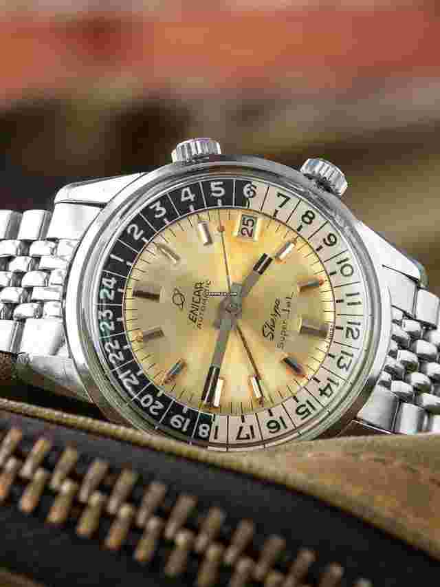 Enicar Sherpa
                           
                                 Tropical 1964 Enicar Sherpa Super Jet GMT (Ref. 146/003) Silver Dial