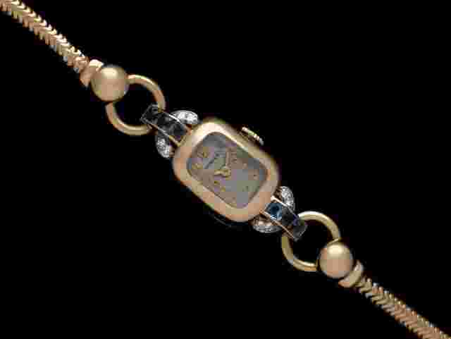 Tiffany
                           
                                 1940's Ladies Vintage Watch - 14K Gold with Diamonds & Sapphires