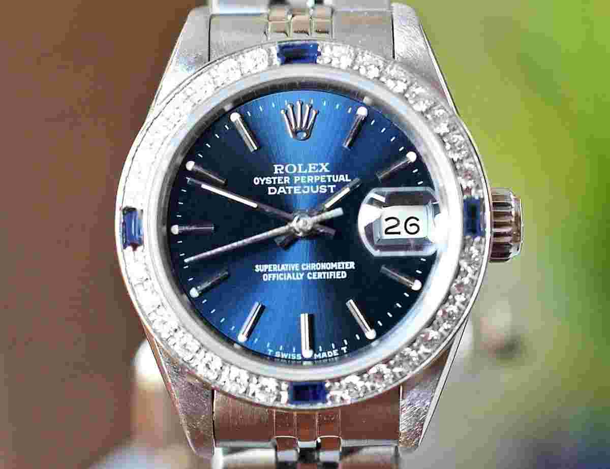 Rolex Oyster Perpetual Lady Date
Ladies Diamond Bezel Blue Dial Steel 26mm Ref. 69160