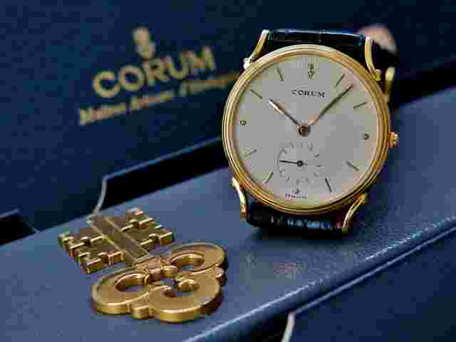 CORUM 18k solid gold vintage mens watch with box Cor