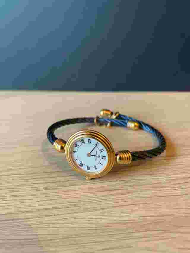 Michel Herbelin CBL01 modèle cable quartz pour femme Montre élégante état neuf set complet écrin cuir+certificat