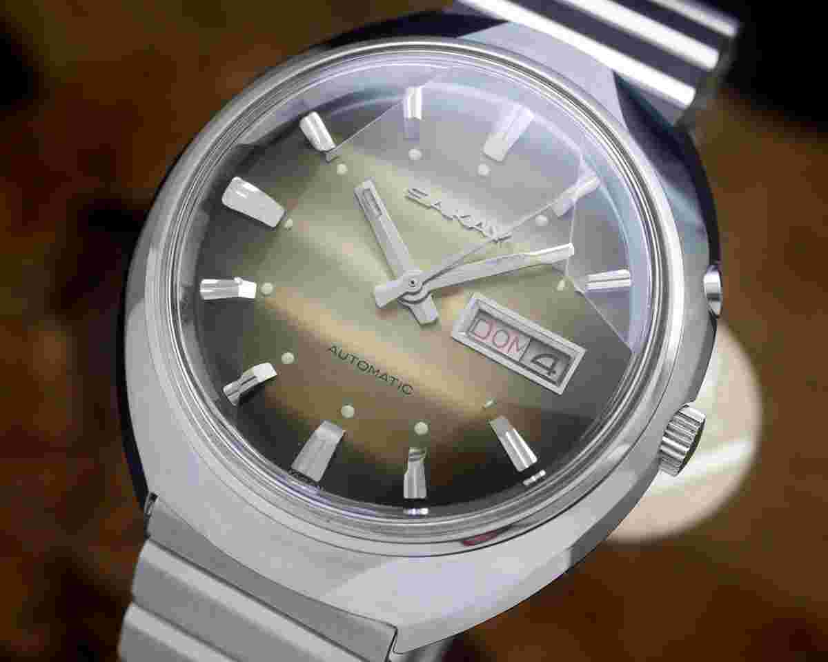 Sakay New Old Stock NOS Automatic faceted crystal vintage Japan made SERVICED WARRANTY Olive/brown dial with a rare texture and faceted crystal! 