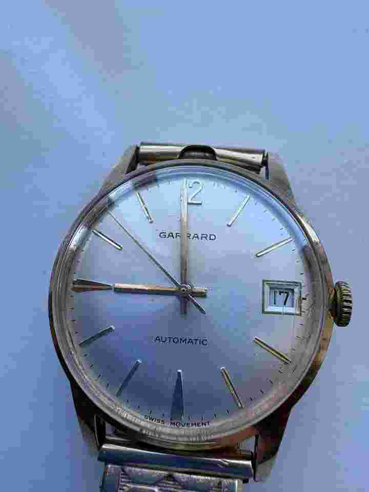 Garrard 9k gold automatic 1974 Eta date movement with 9k rolled gold bracelet