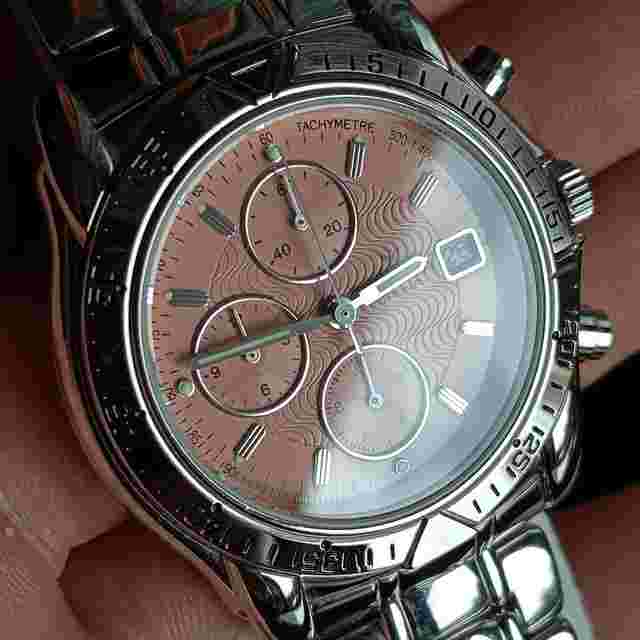 Mondia Zenith Triumph Chronograph - Date Vintage 90 NOS Stunning salmon-colored dial with central workmanship
