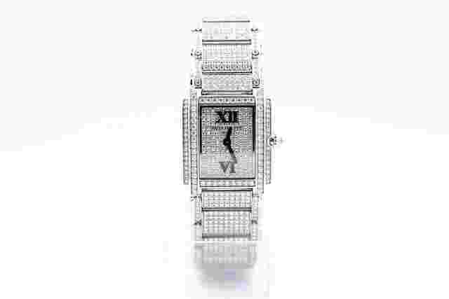 Patek Philippe Twenty~4
                           
                                 White Gold Diamond Pave Open Back Manual Winding