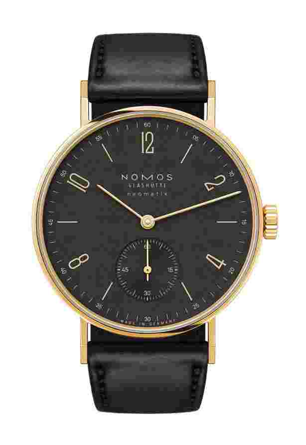 Nomos Glashütte
Tangente gold neomatik ruthenium