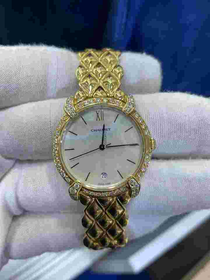 Chaumet
Paris Elysees 18k Gold Mother of Pearl Dial Diamond Bezel 32mm